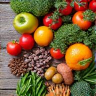 Vibrant, diverse fresh produce arranged beautifully, symbolizing the benefits of plant-based eating.